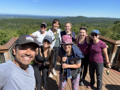 Selfie of Juandiego and all current lab members, taken on the lookout tower at Soapstone Mountain.